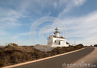 OLD POINT LOMA LIGHTHOUSE UNDER CIRRUS CLOUDS ON POINT LOMA PENINSULA SAN DIEGO CALIFORNIA USA Stock Photo