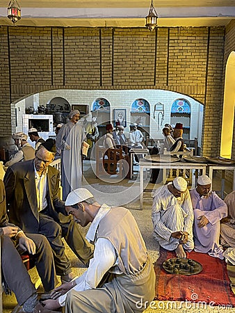 An old popular coffee shop serving tea to customers in the old city of Baghdad Editorial Stock Photo