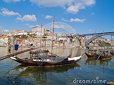 Old Porto and traditional boats with wine barrels Stock Photo