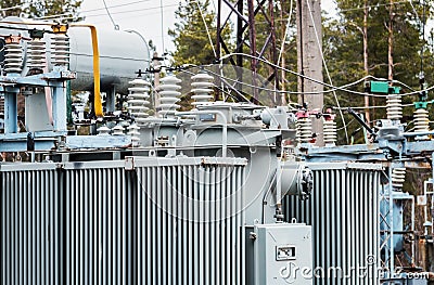 An old power plant with rusty wires, structures Stock Photo