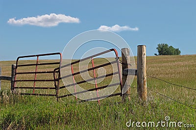 Old prairie pasture metal gate. Stock Photo