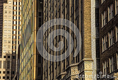 Old pre-modern 1900`s architectural city office building facades , brick, stone, modern office building in background Stock Photo
