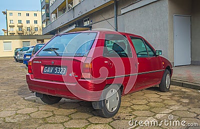 Old purple red Citroen AX parked Editorial Stock Photo