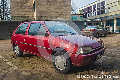 Old purple red Citroen AX parked Editorial Stock Photo