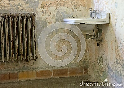 Old radiator and sink in an empty historic home Editorial Stock Photo