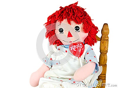 Old rag doll with heart lollipop Stock Photo