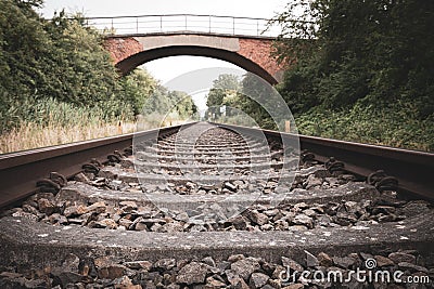 Old Rail tracks lead to horizon Stock Photo