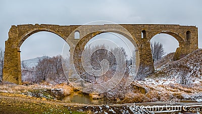 An old railway bridge in the steppe. Stock Photo