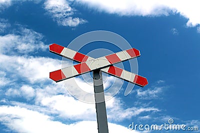 Old railway sign in the blue sky Stock Photo