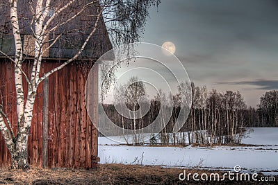 Old red barn in a countryside landscape Stock Photo