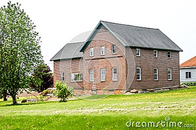 Old Red Brick Colonial House in Wisconsin Stock Photo