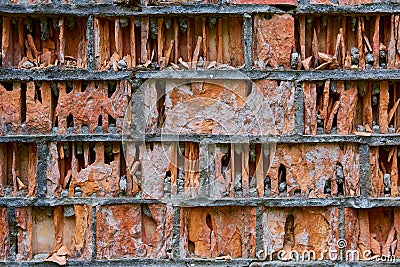old red brick destroyed by erosion weathering and eolation Stock Photo