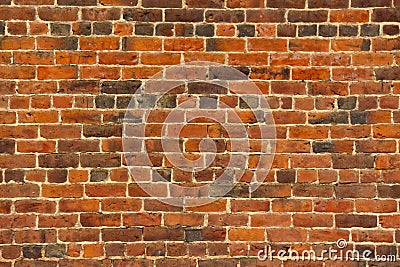 Old Red Brick Wall with Lots of Texture and Color Stock Photo