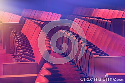 Old red chairs at the empty theatre Stock Photo