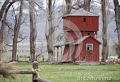 Old red two story outbuilding Stock Photo