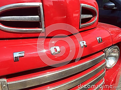 Old red vintage pick-up truck Ford Editorial Stock Photo