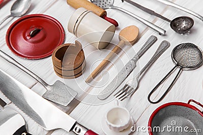 Old red white doll's kitchen miniatures of tin and wood. Vintage Stock Photo