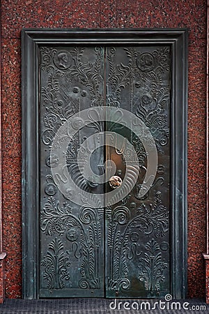 Old retro bronze door Stock Photo