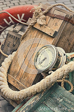 Old retro objects antique textural background wooden crates, chronometer and ropes Stock Photo