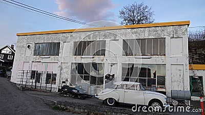 Old retro Saab in front of vintage BP Gasstation in Tingvoll in Norway Editorial Stock Photo