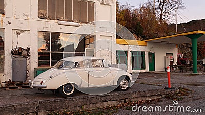 Old retro Saab in front of vintage BP Gasstation in Tingvoll in Norway Stock Photo