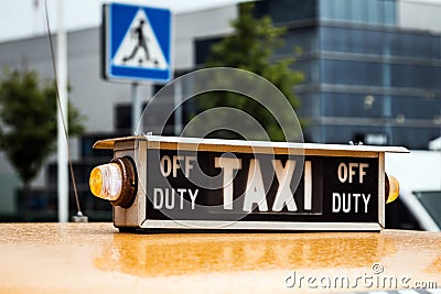 Old retro taxi on the streets Stock Photo