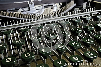Old retro typewriter with mechanical keyboard with alphabet Stock Photo