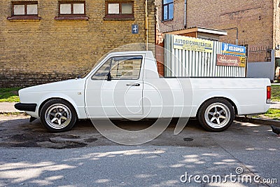 Old retro white volkswagen pickup on the street Editorial Stock Photo