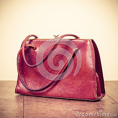 Old retro women leather bag. Vintage style photo Stock Photo