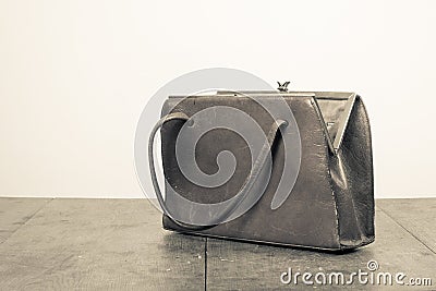 Old retro women leather bag. Vintage style photo Stock Photo