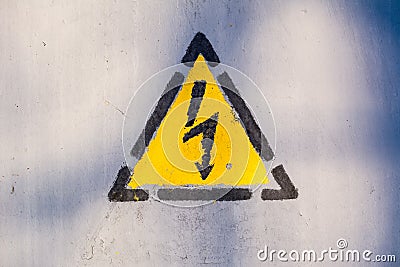 Old risk of electric shock triangle sign Stock Photo