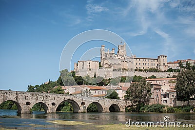old roman bridge and cathedral St Nazaire in Beziers Stock Photo