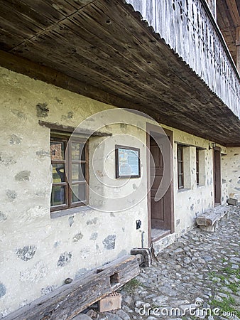 Old Romanian traditional inn at the Village Museum of Valcea County Editorial Stock Photo