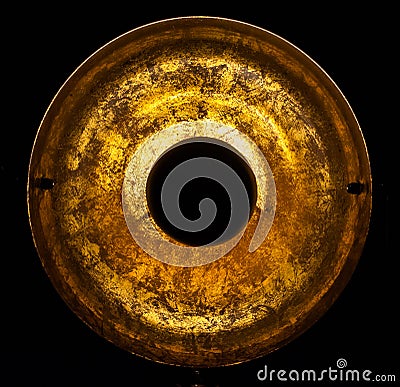 Old round gold object Stock Photo