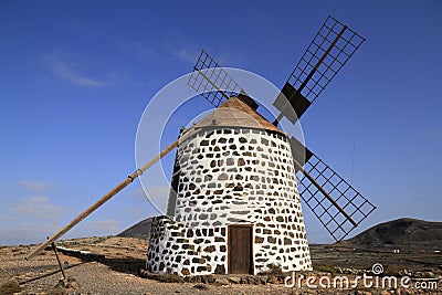 Old round windmill in Villaverde, Fuerteventura Stock Photo