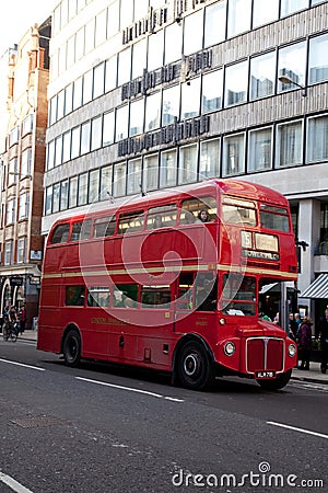 An old Routemaster London bus on the number 15 route to Tower Hill in London Editorial Stock Photo