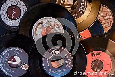 Old 45 rpm single records, backgrounds with modern touch Editorial Stock Photo