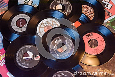 Old 45 rpm single records, backgrounds with modern touch Editorial Stock Photo