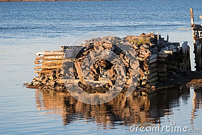 Old ruined jetty. Village of Rabocheostrovsk Stock Photo