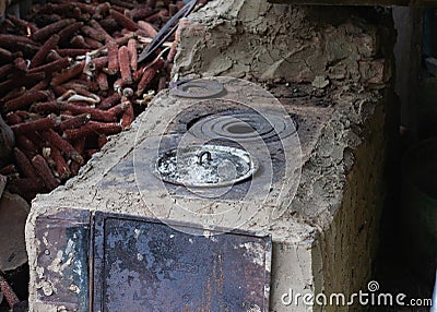 Old rural courtyard clay stove, summer kitchen Stock Photo