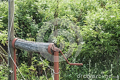 Old rural water well crank element Stock Photo