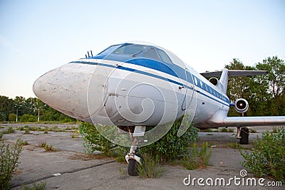 Old russian airplane is on the disused airfield Stock Photo