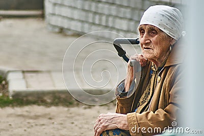 Old Russian woman selling potatoes (Kaluga region). Editorial Stock Photo