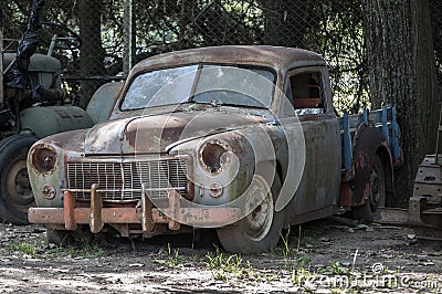 An old, rusted, abandoned car. Stock Photo