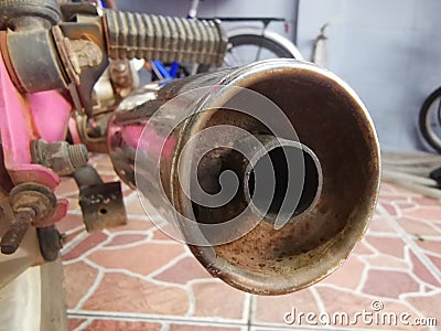 Old rusted Black motorcycle pipes Stock Photo