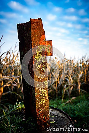 Old rusted fence post Stock Photo