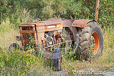 Old rusted tractor. Stock Photo