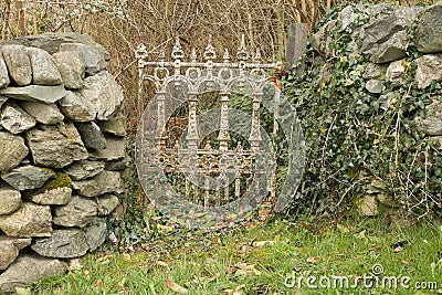 Old rustic iron gate. Stock Photo