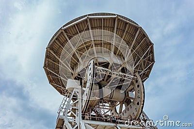 Old rusty abandoned radio telescope satellite dish Stock Photo