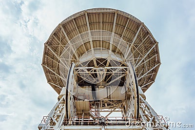 Old rusty abandoned radio telescope satellite dish Stock Photo